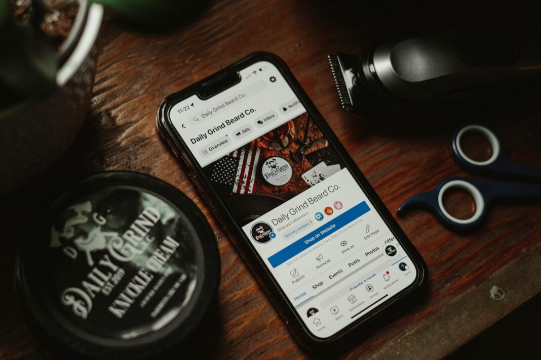 Men's grooming essentials including smartphone and beard care tools in Portland, OR.